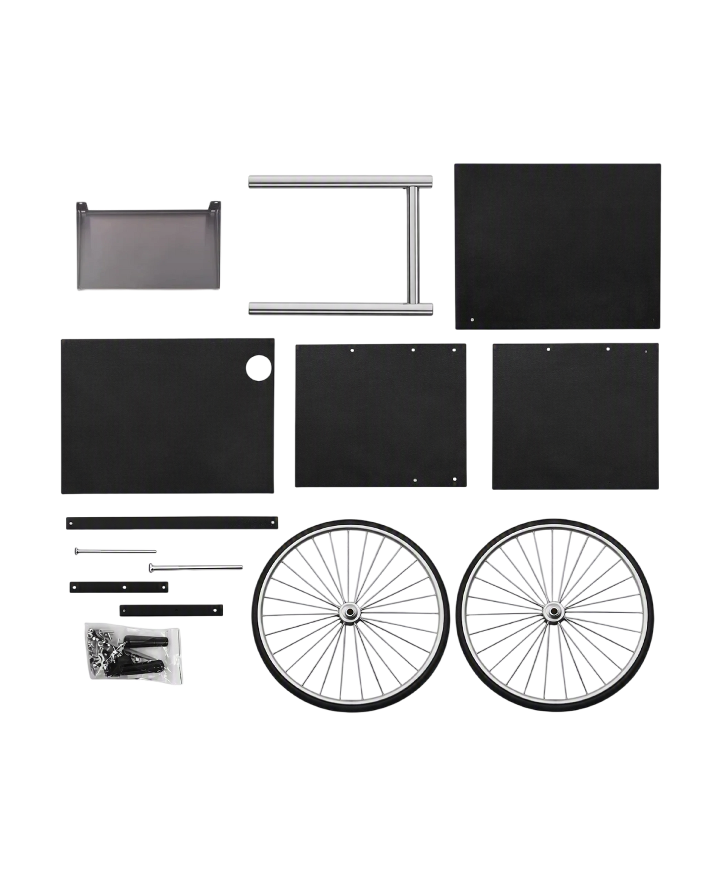 A popcorn machine wagon kit laid out on a white background, including two wheels, several black panels, silver frame tubes, etc.