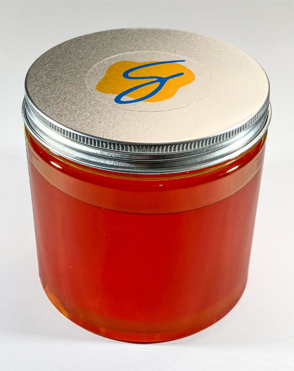 Supreme Colored Coconut Popping Oil with Butter Flavor for making popcorn with an aroma of butter and a golden, yellow, orange tone